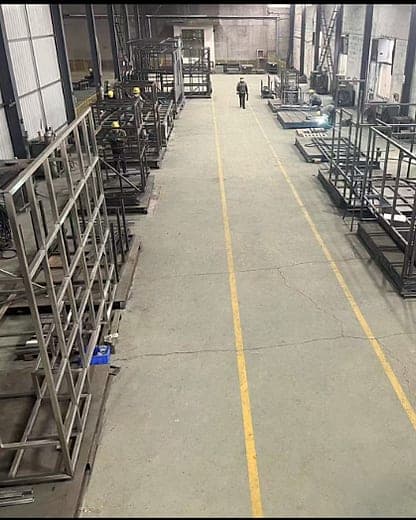 Workshop aisle with metal frames on both sides