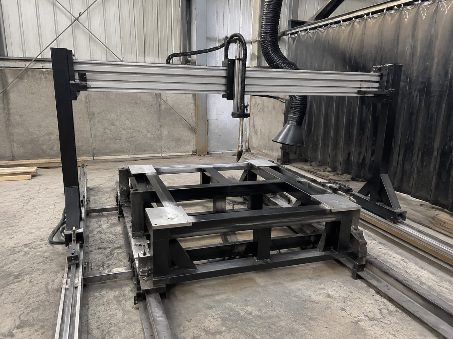 Illustrative configuration of a welding and gantry assembly station around a fabricated frame